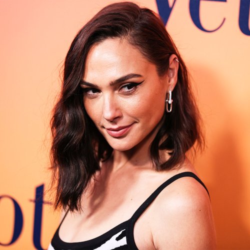 Gal Gadot Shows Off Her Dance Moves While Shaking Up A Cocktail In A White Tank Top—She Looks Incredible!