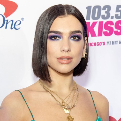 Dua Lipa Nails The 'Bikercore' Trend In A Leather Bustier Top While On A 'Girls Trip' To Mexico City