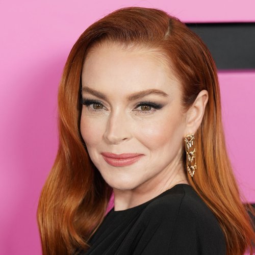 Lindsay Lohan Flaunts Her Tiny Waist In A Black Corset For New Photoshoot As Fans Say 'She Is The Moment'
