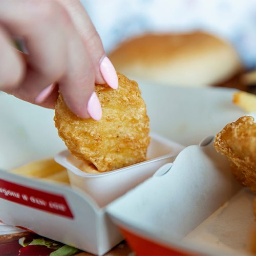 The Scary Reason Doctors Say You Should Never Order Chicken Nuggets At Fast Food Restaurants