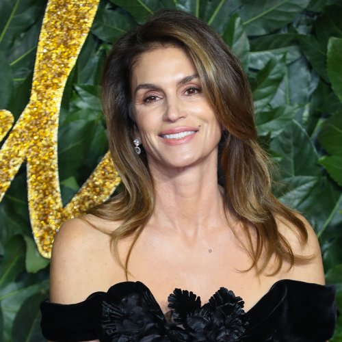 Cindy Crawford Is 'Magic' In A White Wrap Dress At The WWD Los Angeles