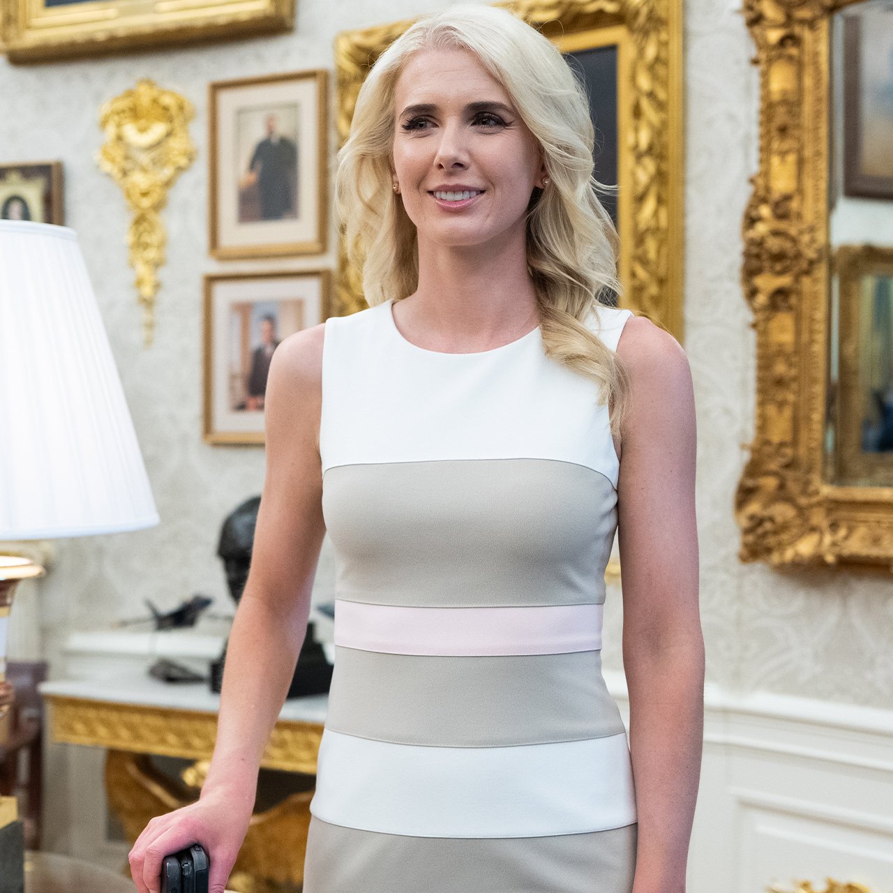 Donald Trump's Devoted Aide Natalie Harp Wows In A Pleated Mini Skirt & Leather Vest While Joining The Trump Family At F