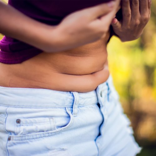 Want A Flatter Stomach? Health Experts Say This Is The One 'Calorie Bomb' Food You Should Avoid