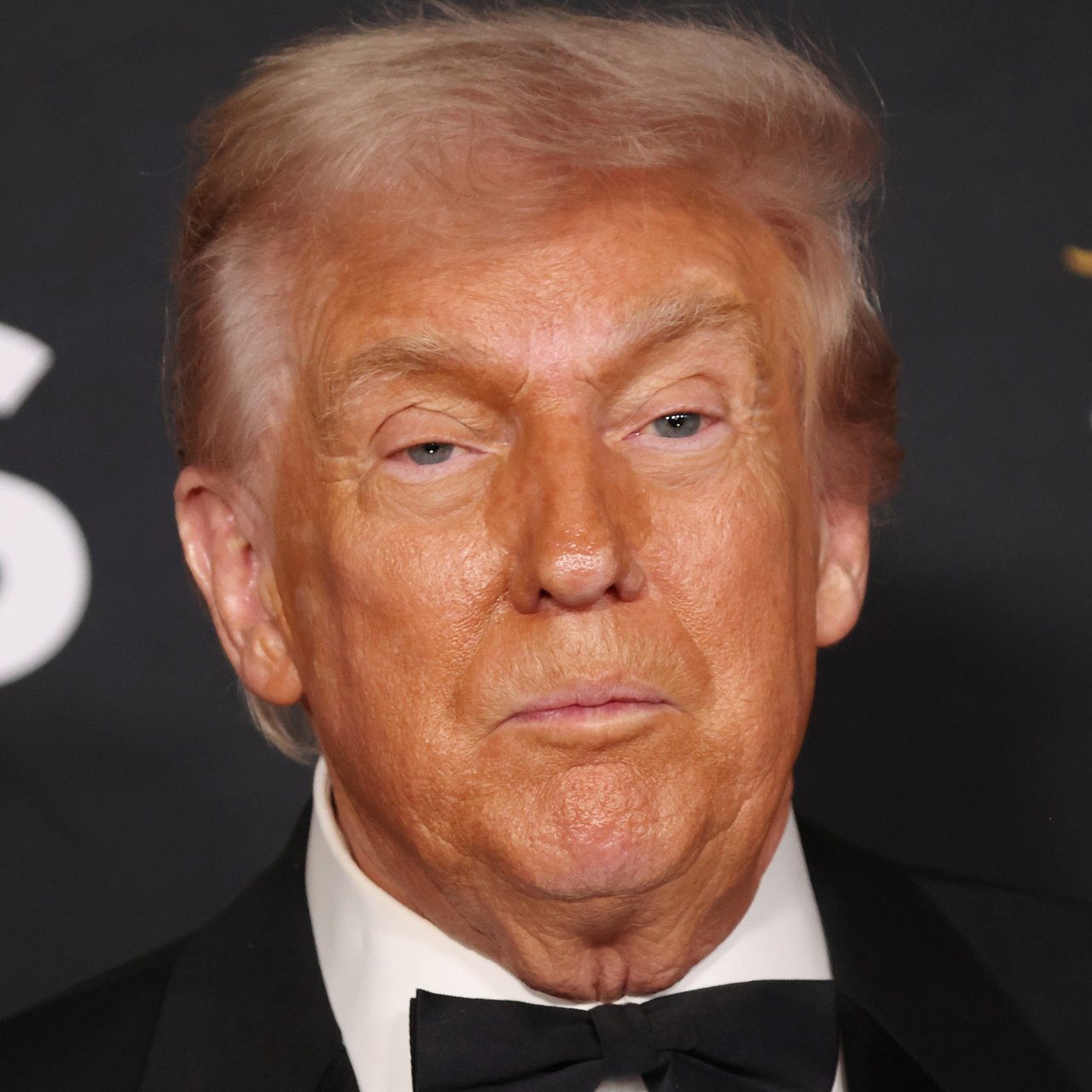 The Internet Is Losing It Over Donald Trump's 'Grandad Trousers' & Slicked-Back Hair After Golf Session: 'His Pants Are