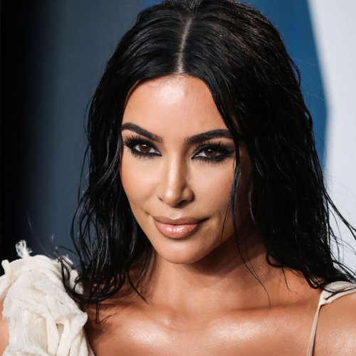 Kim Kardashian Shows Off Her Insane Curves In A Hot Pink String Bikini And Fans Are Obsessed