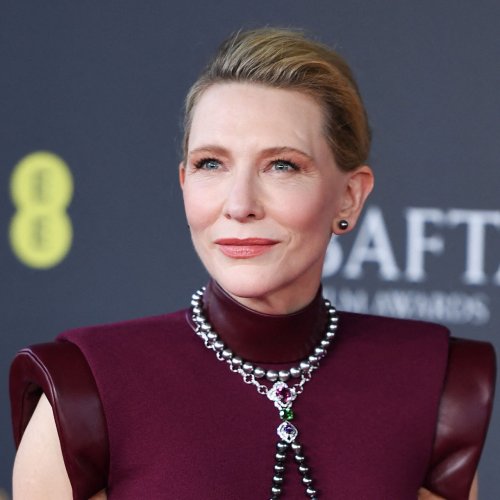 Cate Blanchett Stuns In A Burgundy Louis Vuitton Gown With Body Jewelry As She’s Seen With Prince William At The BAFTAs