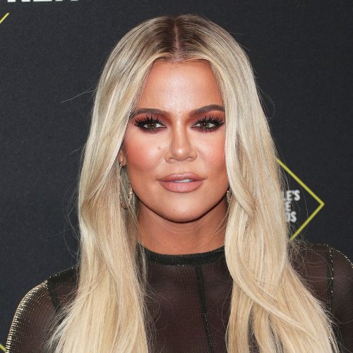 Khloé Kardashian Put It All On Display In A Tight Glittery Silver ...