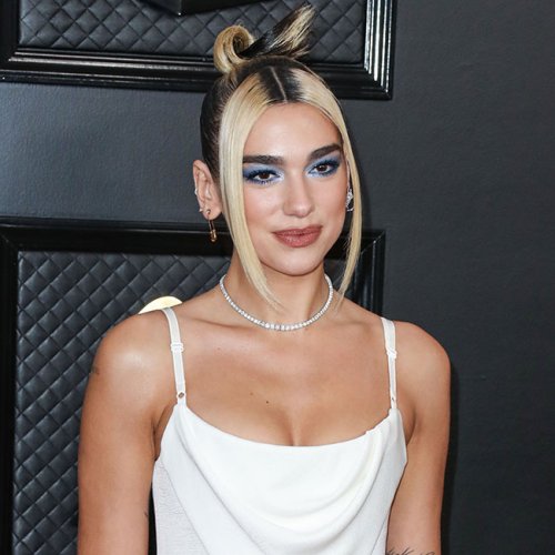 Dua Lipa Shows Off Her Enviable Curves In A Skintight Black Dress—Did We Mention Its Insane Front Cut-Outs?!