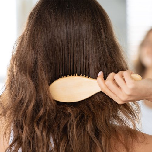 A Dermatologist Reveals The Popular Hair Growth Supplements That Actually Aren't 'Worth The Money'—#1 Is Linked To Heart Attacks
