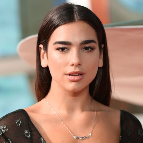 Dua Lipa Sizzles In A Plunging 90s Racerback Maxi Dress—It's Almost Too Hot To Handle!
