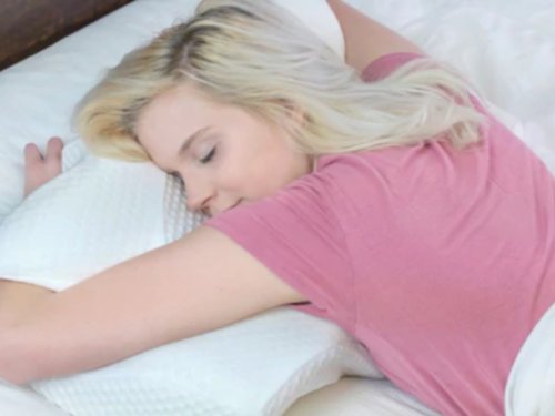 TikTok & Customers Alike Are Praising This Pillow For Reportedly Healing Their Neck & Back Pain