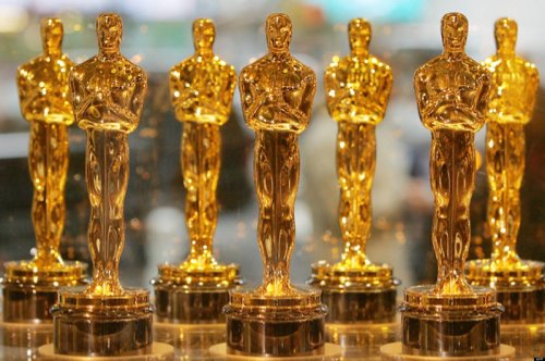 "Oscarheimer" Academy Awards Add More Presenters Including Rita Moreno, The Rock, Bad Bunny, and Kate McKinnon aka Bad Barbie - Showbiz411
