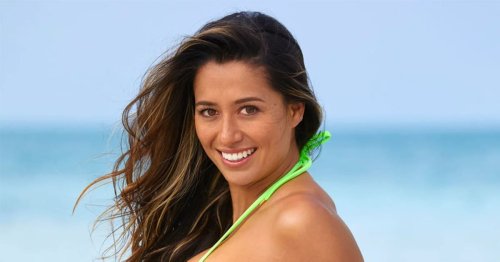Malia Manuel Surfs the Waves in Neon Swimwear in Turks and Caicos