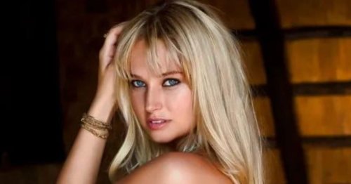 We’ll Never Get Over These Fierce Pics of Genevieve Morton Posing With a Lion in Zambia