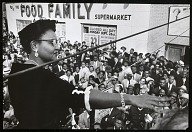 Mamie Bradley speaking to anti-lynching rally after acquittal of men accused of killing her son, Emmett Till, Harlem, NY