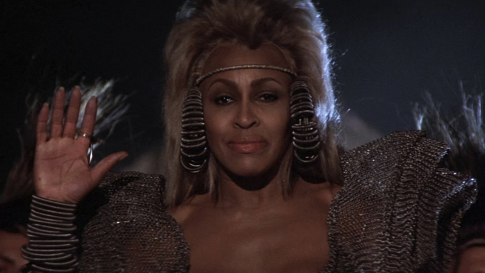 Tina Turner's Mad Max Role Extends Beyond Her Villainous Character - /Film