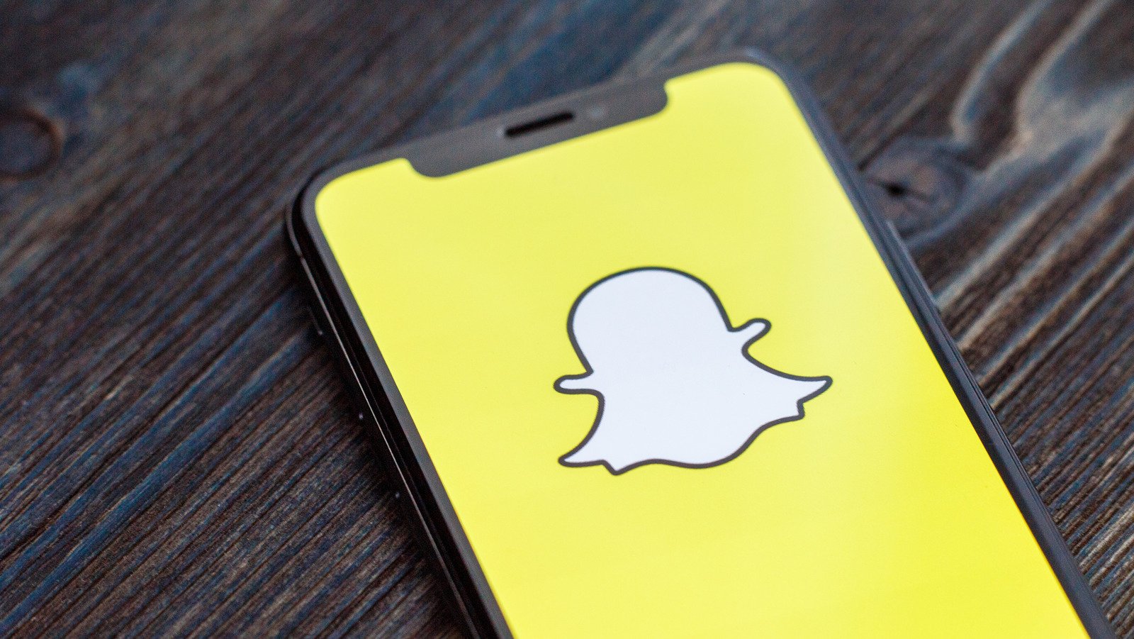 The Reason Why The Snapchat Logo Is A Ghost - SlashGear