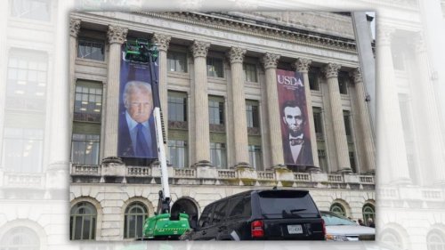 Huge banner of Trump hung on USDA building next to one of Lincoln