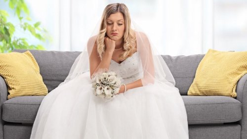 Mom refuses to let lesbian daughter alter her old wedding dress to be a suit. + Update