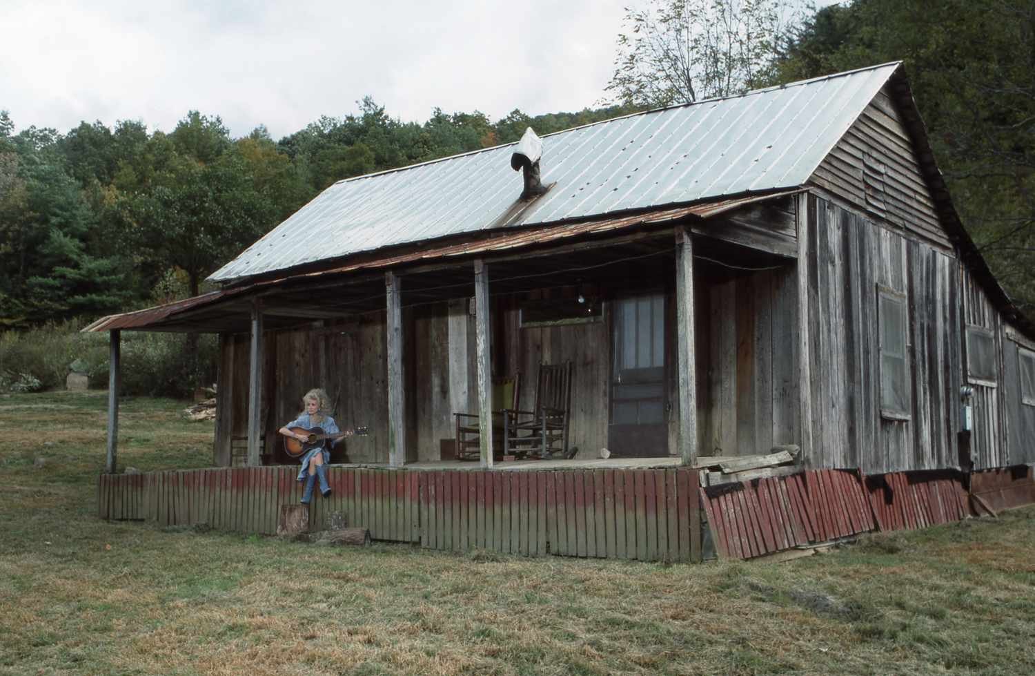 Dolly Parton Grew Up In A 1-Room Cabin—Here’s The Story Behind The Tennessee Home That Shaped Her