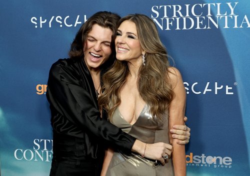 Elizabeth Hurley’s 21-Year-Old Son Reacts to Billy Ray Cyrus Smooching His Mom