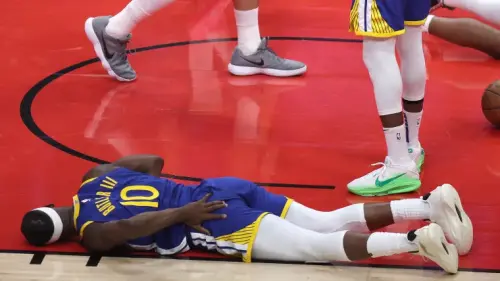 Warriors' Jimmy Butler takes nasty fall after ugly undercut by Rockets' Amen Thompson