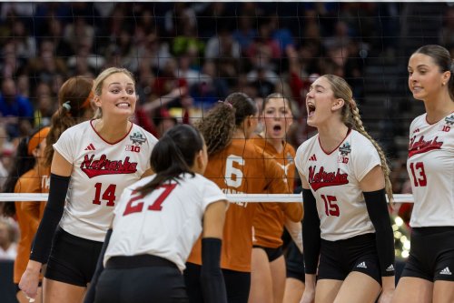 Nebraska Volleyball's Andi Jackson shows support for Xavier’s Isaac Wachsmann after Big East Tournament win over UConn