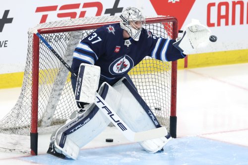 'That'd just be dumb': Jets' Connor Hellebuyck gives his thoughts on Blues' Jordan Binnington beckoning for a goalie fightd in Game 1 of Jets vs Blues