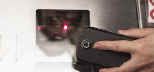 Barcodes converted to pulsing lights are readable from phones by standard supermarket scanners
