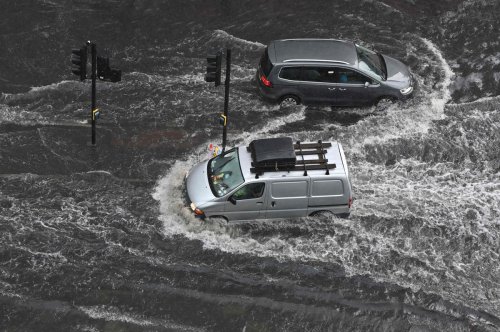 London roads and Tube stations flooded as thunderstorms strike south of England