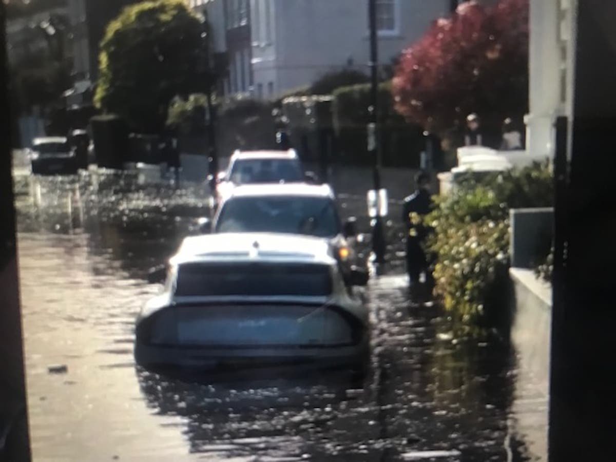 Cars stranded after 'supermoon' tide sparks west London flooding