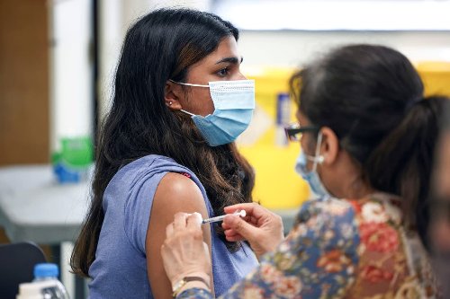 All adults invited to book jab as Delta variant hospital cases double