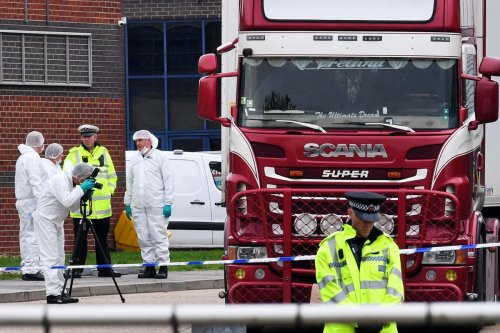 Vietnamese police arrest eight people in connection with lorry deaths