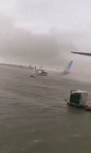 Dubai airport submerged in water as United Arab Emirates hit with year's worth of rain within hours
