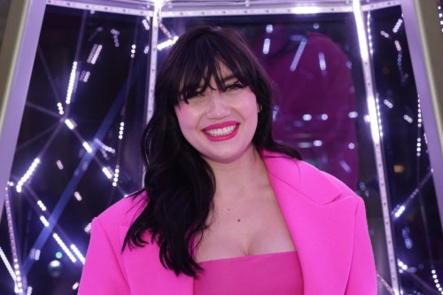 Pregnant Daisy Lowe shows off her bump in bright pink outfit at Claridge’s Christmas tree party