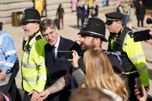 Rees-Mogg booed by protesters in Birmingham as Tory conference kicks off