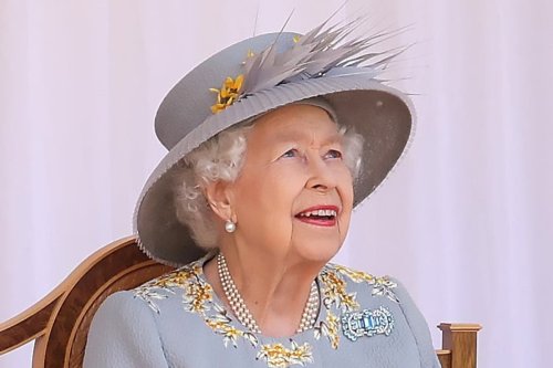 Queen beams as she watches mini Trooping of Colour at Windsor
