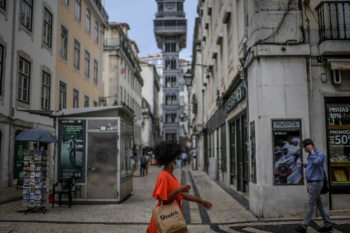 Portugal begins to ease Covid restrictions on path to ‘total freedom’