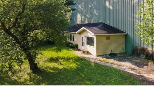 This 690-square-foot home for sale comes with, well, something very extra. Check it out