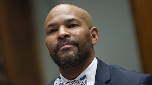 Former surgeon general Jerome Adams tries to outrun the shadow of the president he served