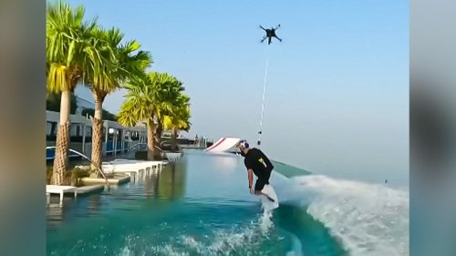 Wakeskater rast an Drohne durch Infinity-Pool – dann geht es 300 Meter in die Tiefe