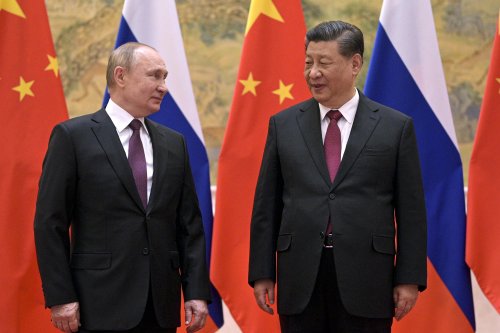 China denies asking Russia not to invade until post-Olympics