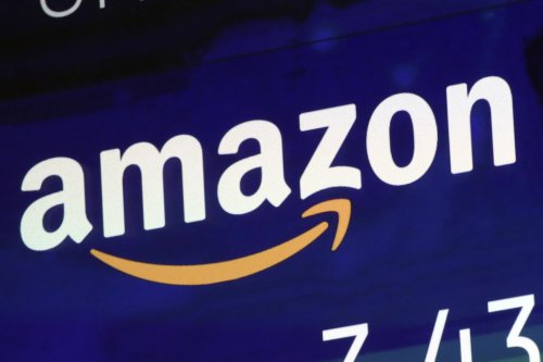 Amazon's UK site backs away from plan to stop taking Visa | AP News
