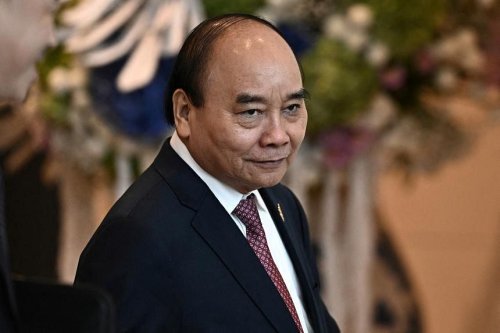 Former Vietnam president says he quit due to others’ violations