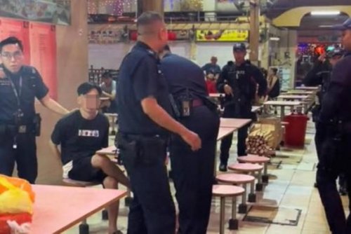 Concealed knife drops after man bumps into table at hawker centre