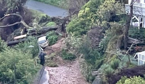 Live: Maitai man winched from his home after slip blocks driveway