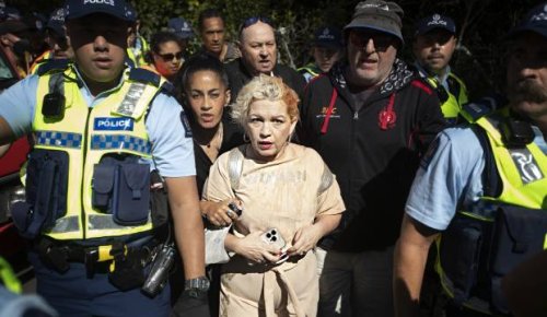 Anti-trans activist Posie Parker escorted out of Auckland rally, hit by soup