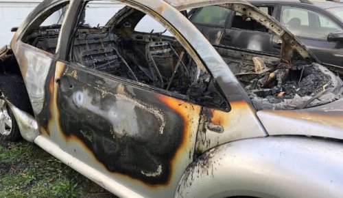 Men wake up to car fire in front yard