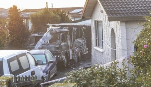 Fears father may have died in caravan fire while son slept next door