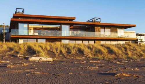Spectacular art-filled Taranaki home matches its dramatic beachfront setting